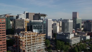 DX0001_011_009 - 5.7K aerial stock footage flying over Willamette River, approaching downtown buildings, Downtown Portland, Oregon