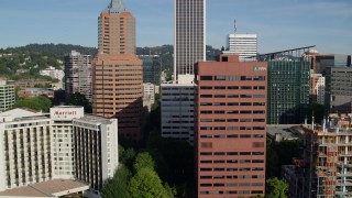 DX0001_011_017 - 5.7K aerial stock footage flying by Umpqua Bank Plaza, downtown skyscrapers, Downtown Portland, Oregon