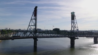 5.7K aerial stock footage flying over Hawthorne bridge spanning Willamette River, Downtown Portland, Oregon Aerial Stock Footage | DX0001_011_027