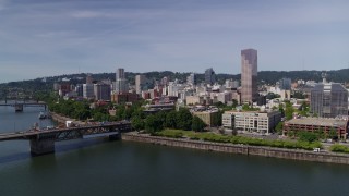 DX0001_012_003 - 5.7K aerial stock footage of Burnside Bridge, Willamette River and Downtown Portland, Oregon