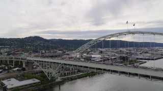 DX0001_013_010 - 5.7K aerial stock footage of Fremont Bridge and Northwest industrial area, Portland, OR