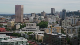 5.7K aerial stock footage of skyscrapers and condo complexes at sunset in Downtown Portland, Oregon Aerial Stock Footage | DX0001_013_014