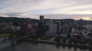 5.7K aerial stock footage of the Downtown Portland skyline from Willamette River, twilight, Oregon Aerial Stock Footage | DX0001_014_020