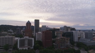 5.7K aerial stock footage flying away from downtown office buildings at twilight, Downtown Portland, Oregon Aerial Stock Footage | DX0001_014_022