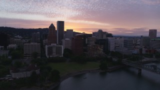 DX0001_014_028 - 5.7K aerial stock footage flying toward Downtown Portland, Oregon at twilight