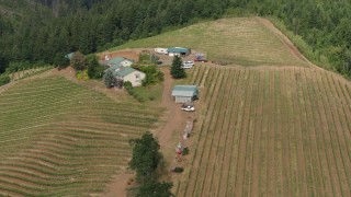 5.7K aerial stock footage approach and flyby a hilltop winery and vineyards, Hood River, Oregon Aerial Stock Footage | DX0001_016_007