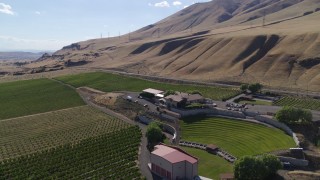 5.7K aerial stock footage of flying by the Maryhill Winery in Goldendale, Washington Aerial Stock Footage | DX0001_018_002