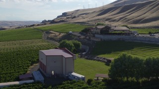 DX0001_019_003 - 5.7K aerial stock footage of a low altitude orbit of the Maryhill Winery in Goldendale, Washington