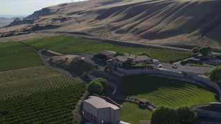 5.7K aerial stock footage fly over amphitheater to orbit Maryhill Winery main building in Goldendale, Washington Aerial Stock Footage | DX0001_019_018