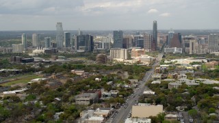 5.7K aerial stock footage slow pass by Congress Avenue leading to city's skyline in Downtown Austin, Texas Aerial Stock Footage | DX0002_103_025