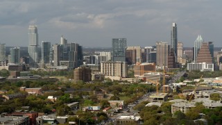 DX0002_103_028 - 5.7K aerial stock footage ascend for a view of the city's skyline in Downtown Austin, Texas