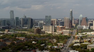 5.7K aerial stock footage flyby Congress Avenue leading to the city's skyline and state capitol, Downtown Austin, Texas Aerial Stock Footage | DX0002_103_032