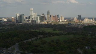 5.7K aerial stock footage of a wide view of city's towering skyline, seen from freeway, Downtown Austin, Texas Aerial Stock Footage | DX0002_104_024