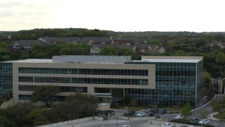 5.7K aerial stock footage of orbiting a modern office building in Austin, Texas Aerial Stock Footage | DX0002_104_026