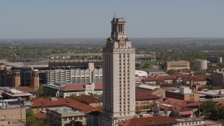 DX0002_108_002 - 5.7K aerial stock footage ascend and closely orbit UT Tower at the University of Texas, Austin, Texas