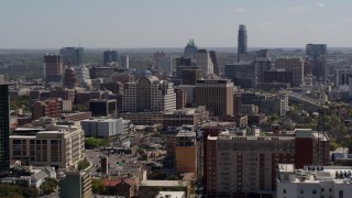 5.7K aerial stock footage descend and flyby the capitol, office buildings and city skyline in Downtown Austin, Texas Aerial Stock Footage | DX0002_108_008