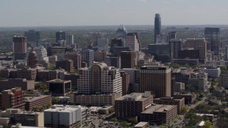 5.7K aerial stock footage of passing the capitol and office buildings, and city skyline in Downtown Austin, Texas Aerial Stock Footage | DX0002_108_010