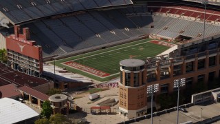 DX0002_108_026 - 5.7K aerial stock footage of the empty field at the football stadium at the University of Texas, Austin, Texas