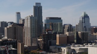 5.7K aerial stock footage flyby city skyscrapers to focus on The Austonian and high-rise hotel in Downtown Austin, Texas Aerial Stock Footage | DX0002_108_030