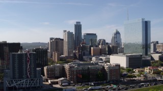 5.7K aerial stock footage of tall city skyscrapers seen while ascending near hotel in Downtown Austin, Texas Aerial Stock Footage | DX0002_108_040