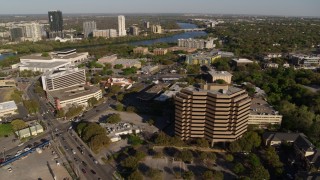 5.7K aerial stock footage of two busy street intersections between hotel and office complex, Austin, Texas Aerial Stock Footage | DX0002_109_028