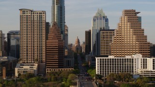 5.7K aerial stock footage of downtown skyscrapers, reveal the state capitol in Downtown Austin, Texas Aerial Stock Footage | DX0002_109_039