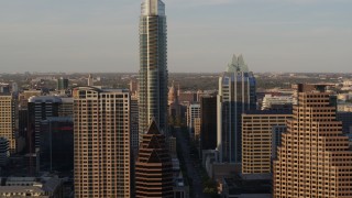 5.7K aerial stock footage fly between downtown skyscrapers, reveal Texas State Capitol in Downtown Austin, Texas Aerial Stock Footage | DX0002_109_042