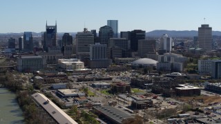 5.7K aerial stock footage of a reverse view of the city's skyline, seen from the river, Downtown Nashville, Tennessee Aerial Stock Footage | DX0002_113_010