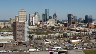 5.7K aerial stock footage of the city's skyline seen from apartment complexes in Downtown Nashville, Tennessee Aerial Stock Footage | DX0002_113_016