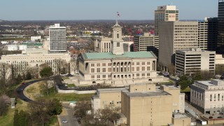 DX0002_113_033 - 5.7K aerial stock footage of slowly orbiting the Tennessee State Capitol building in Downtown Nashville, Tennessee