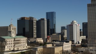 DX0002_113_038 - 5.7K aerial stock footage the 505 skyscraper seen while flying between state capitol and Tennessee Tower in Downtown Nashville, Tennessee