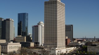 5.7K aerial stock footage of descend and orbit Tennessee Tower in Downtown Nashville, Tennessee Aerial Stock Footage | DX0002_113_043