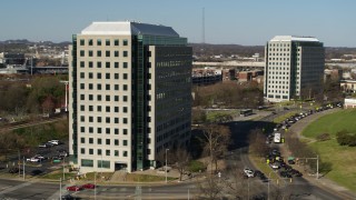 5.7K aerial stock footage of orbiting a government office building to reveal a second building in Downtown Nashville, Tennessee Aerial Stock Footage | DX0002_113_045