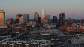 5.7K aerial stock footage approach and flyby the city's skyline at sunset in Downtown Nashville, Tennessee Aerial Stock Footage | DX0002_115_010