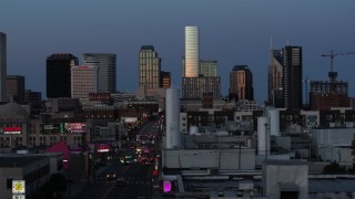 5.7K aerial stock footage flashing lights on Church Street and view of city's skyline at twilight in Downtown Nashville, Tennessee Aerial Stock Footage | DX0002_115_023