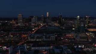 5.7K aerial stock footage flyby Church Street and city skyline at twilight, reveal high-rise construction, Downtown Nashville, Tennessee Aerial Stock Footage | DX0002_115_037