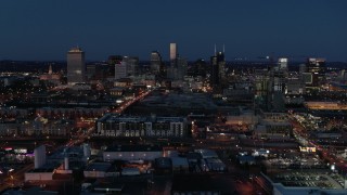 5.7K aerial stock footage wide view of city skyline at twilight, near high-rise construction, Downtown Nashville, Tennessee Aerial Stock Footage | DX0002_115_038