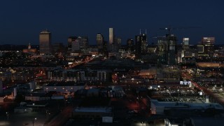 5.7K aerial stock footage ascend and flyby the city skyline at twilight, Downtown Nashville, Tennessee Aerial Stock Footage | DX0002_115_041