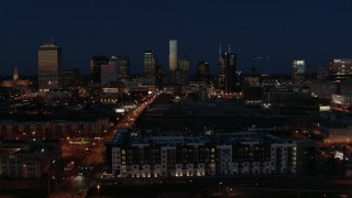 5.7K aerial stock footage slowly pass the city skyline at twilight and ascend, Downtown Nashville, Tennessee Aerial Stock Footage | DX0002_115_043