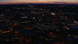 5.7K aerial stock footage slowly orbit and approach a hospital complex at twilight, Nashville, Tennessee Aerial Stock Footage | DX0002_115_047