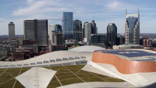 5.7K aerial stock footage the city's skyline seen from convention center roof, Downtown Nashville, Tennessee Aerial Stock Footage | DX0002_117_038