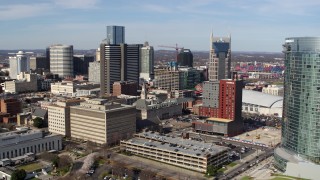 5.7K aerial stock footage ascend and approach skyscrapers, city buildings in Downtown Nashville, Tennessee Aerial Stock Footage | DX0002_118_001