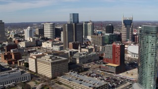 5.7K aerial stock footage a reverse view of skyscrapers and city buildings in Downtown Nashville, Tennessee Aerial Stock Footage | DX0002_118_002