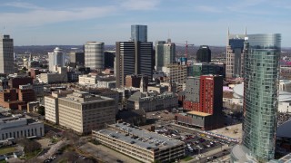 5.7K aerial stock footage approaching and flying by skyscrapers, city buildings in Downtown Nashville, Tennessee Aerial Stock Footage | DX0002_118_003