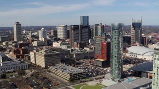 5.7K aerial stock footage of Renaissance Nashville hotel, reveal the JW Marriott in Downtown Nashville, Tennessee Aerial Stock Footage | DX0002_118_009