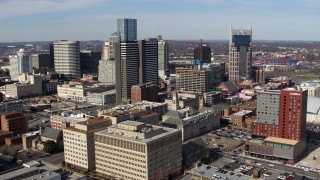 5.7K aerial stock footage stationary view of high-rise hotel and skyscrapers before approach in Downtown Nashville, Tennessee Aerial Stock Footage | DX0002_118_015