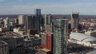 DX0002_119_002 - 5.7K aerial stock footage flyby the JW Marriott hotel to approach Renaissance Hotel, Downtown Nashville, Tennessee