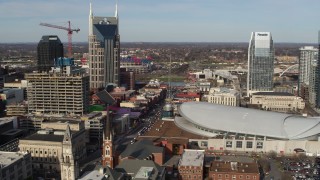 5.7K aerial stock footage flyby Broadway and Bridgestone Arena in Downtown Nashville, Tennessee Aerial Stock Footage | DX0002_119_006