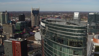 DX0002_119_014 - 5.7K aerial stock footage flyby JW Marriott for view of AT&T Building, Bridgestone Arena, Pinnacle skyscraper, Downtown Nashville, Tennessee