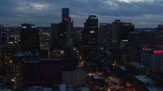 5.7K aerial stock footage flying past a group of skyscrapers at twilight during descent, Downtown Nashville, Tennessee Aerial Stock Footage | DX0002_120_040